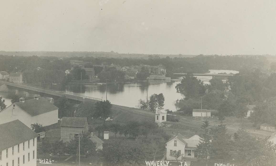 history of Iowa, house, Waverly Public Library, Waverly, IA, Main Streets & Town Squares, Iowa, river, Aerial Shots, Iowa History, Cities and Towns, Lakes, Rivers, and Streams, bridge