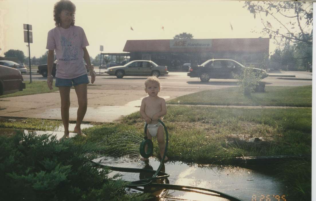 Twitchell, Hannah, history of Iowa, Motorized Vehicles, hardware store, Iowa, Grinnell, IA, Cities and Towns, car, Children, diaper, sprinkler, Iowa History, Leisure