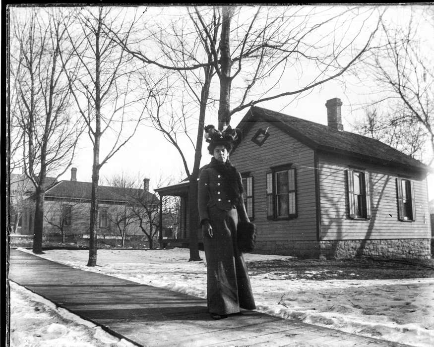 IA, Iowa, coat, sidewalk, house, Anamosa Library & Learning Center, Winter, history of Iowa, snow, Iowa History