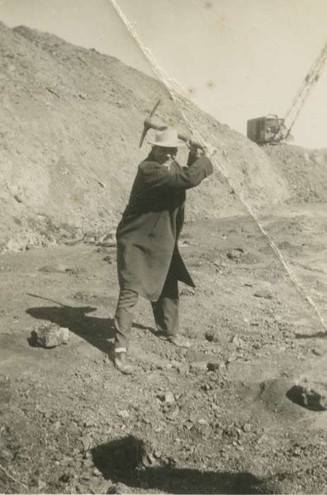 worker, project site, history of Iowa, Iowa History, IA, Schlawin, Kent, Businesses and Factories, quarry, coat, Iowa, dirt, rocks, pickaxe, hat, Labor and Occupations