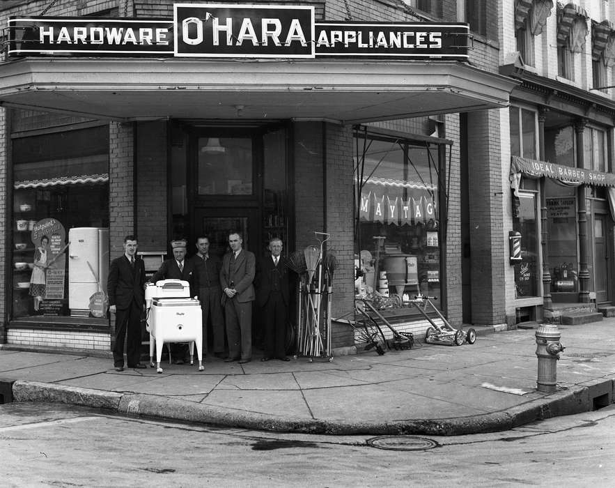 Main Streets & Town Squares, history of Iowa, Iowa History, Ottumwa, IA, Lemberger, LeAnn, hardware store, storefront, Businesses and Factories, lawn mower, washing machine, fire hydrant, Cities and Towns, Iowa, sign, maytag, broom