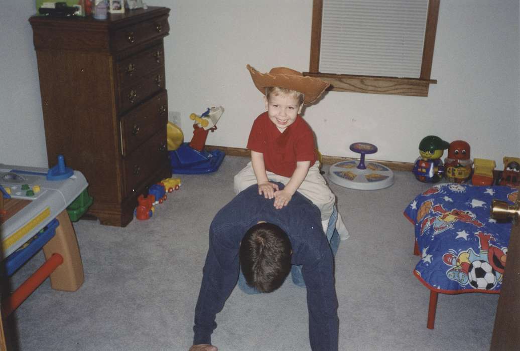 bedroom, Iowa, silly, toys, hat, Families, Children, Determan, Taryn, Homes, Camanche, IA, history of Iowa, cowboy, Iowa History