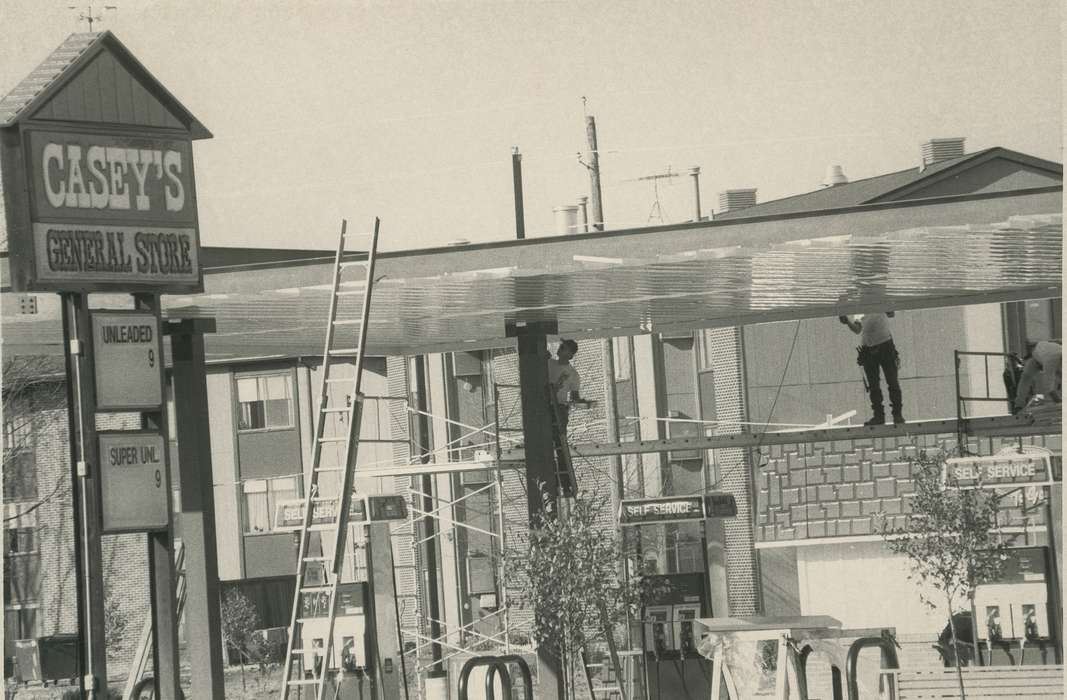 Waverly Public Library, working men, history of Iowa, Iowa History, Businesses and Factories, Waverly, IA, gas station, Iowa, Cities and Towns, construction, construction crew, Labor and Occupations