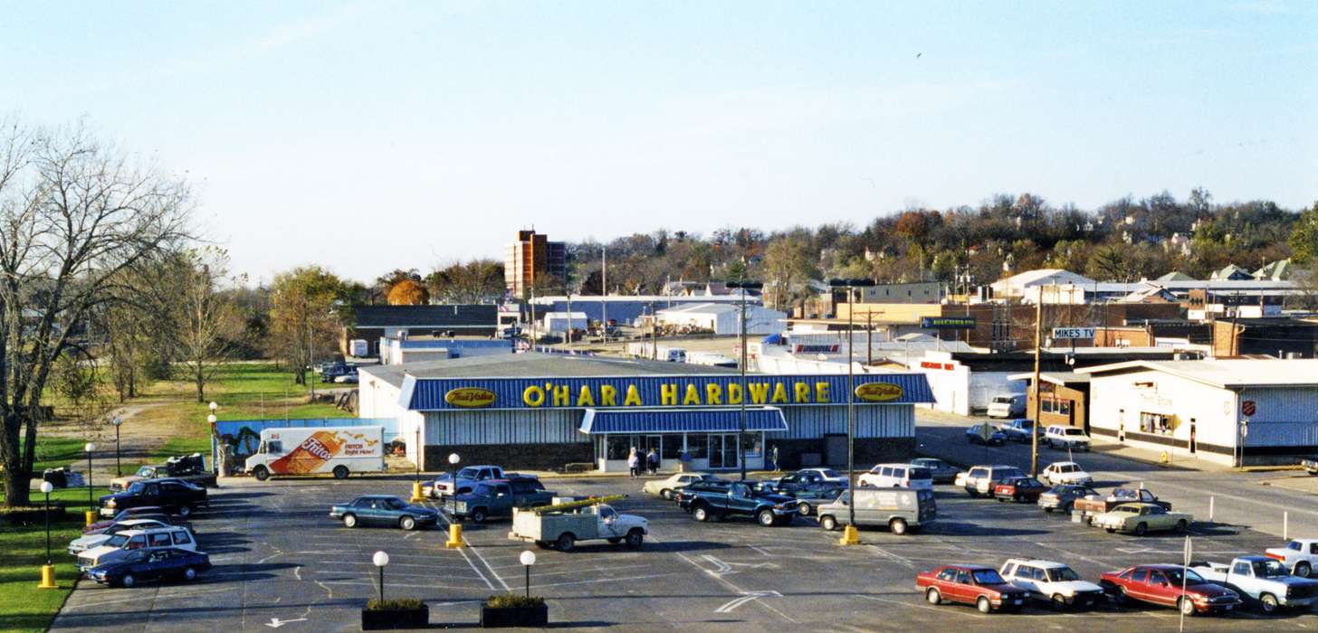 history of Iowa, Iowa History, Ottumwa, IA, lays, hardware store, Motorized Vehicles, Businesses and Factories, ford, store, fritos, car, parking lot, Aerial Shots, Iowa, Lemberger, LeAnn, small business