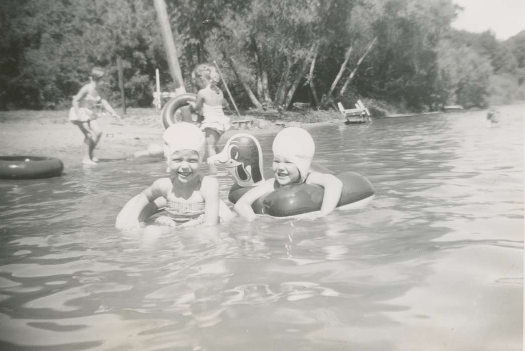 swimsuit, floaties, Eldora, IA, Iowa History, Lakes, Rivers, and Streams, Iowa, bathing suit, lake, swimming suit, beach, Vauthier, Elizabeth, floaty, Outdoor Recreation, bathing cap, swimming cap, Children, history of Iowa