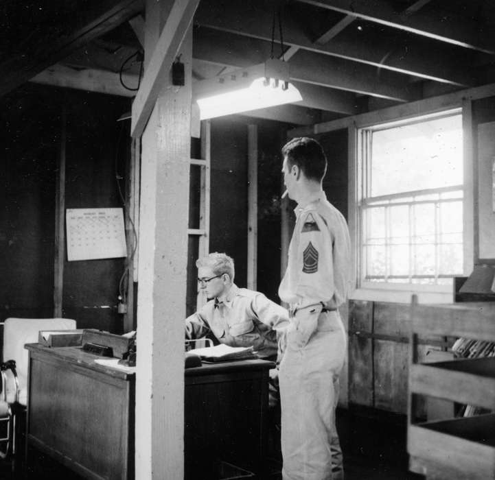 uniform, calendar, Iowa, cigarette, Businesses and Factories, desk, Portraits - Individual, Karns, Mike, smoking, Labor and Occupations, history of Iowa, Ely, IA, Iowa History