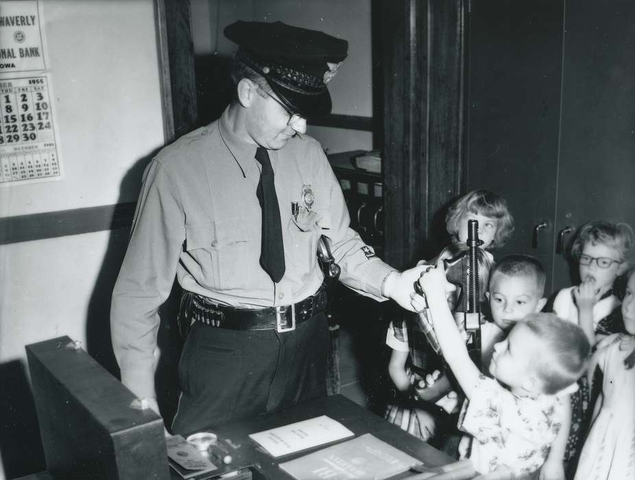 police, history of Iowa, Iowa History, children, Civic Engagement, gun, machine gun, police officer, Iowa, Children, Waverly Public Library, Labor and Occupations