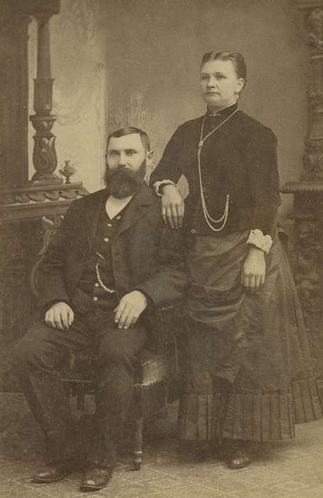 woman, Cedar Rapids, IA, brooch, man, carte de visite, Iowa, vest, correct date needed, Olsson, Ann and Jons, couple, Families, Portraits - Group, Iowa History, painted backdrop, mustache, history of Iowa, sack coat, beard, pocket watch chain