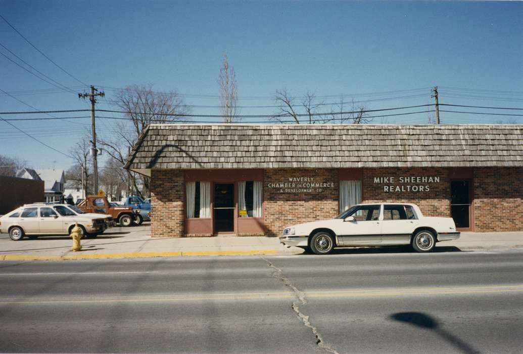 history of Iowa, Businesses and Factories, Waverly, IA, telephone pole, Waverly Public Library, Iowa, Motorized Vehicles, trees, Iowa History, trucks, Cities and Towns, chamber of commerce, cars