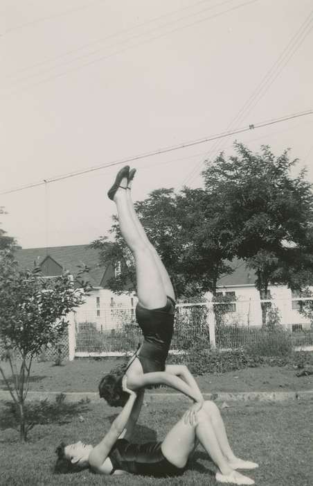 Portraits - Group, backyard, USA, Iowa, curly hair, Wilson, Dorothy, bathing suit, Leisure, acrobats, Homes, history of Iowa, acrobatic, fence, tree, Iowa History