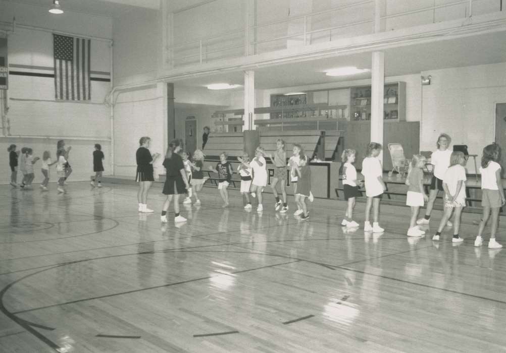 girl, gymnasium, Waverly Public Library, Iowa History, history of Iowa, american flag, school, Schools and Education, bleachers, Plainfield, IA, Iowa, Children