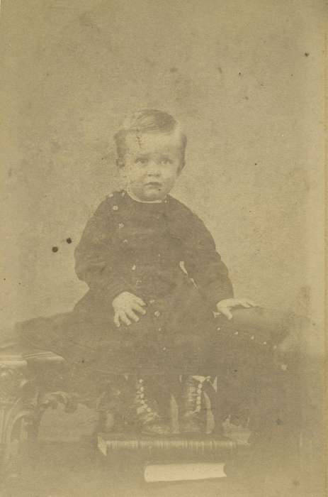 history of Iowa, carte de visite, Iowa History, books, child, boots, high buttoned shoes, Maquoketa, IA, Iowa, boy, Olsson, Ann and Jons, Children, Portraits - Individual