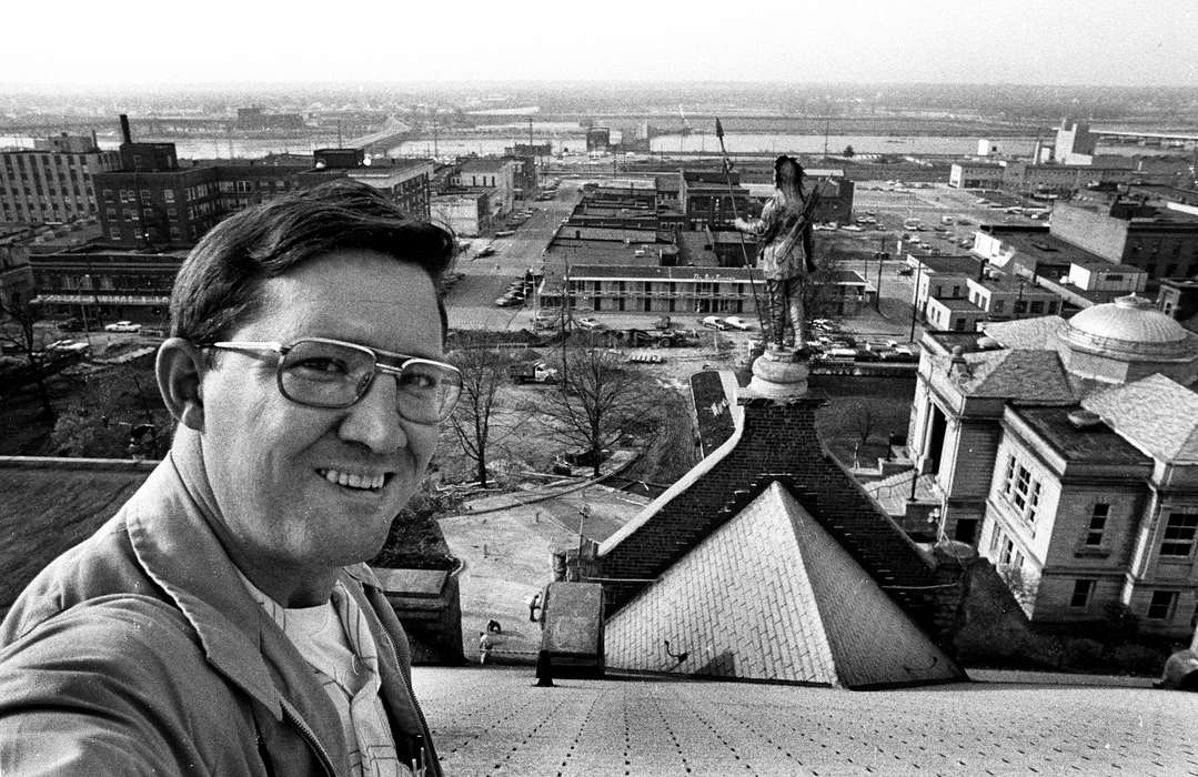 glasses, des moines river, Portraits - Individual, Cities and Towns, Iowa History, Lakes, Rivers, and Streams, Iowa, Lemberger, LeAnn, roof, statue, Ottumwa, IA, Aerial Shots, courthouse, river, history of Iowa