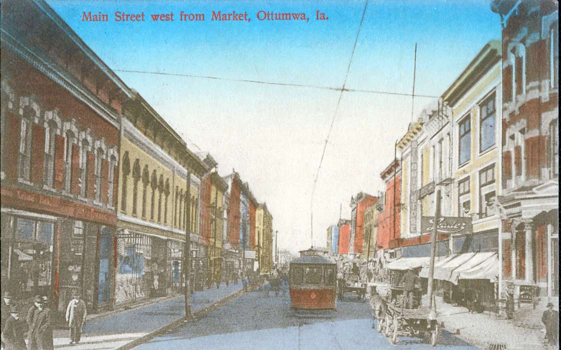 mainstreet, Ottumwa, IA, Iowa, storefront, veranda, horse and buggy, Lemberger, LeAnn, color, Cities and Towns, Businesses and Factories, history of Iowa, Motorized Vehicles, Main Streets & Town Squares, Iowa History, street car