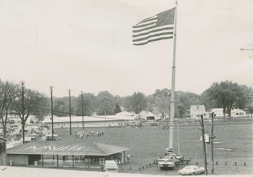crane, history of Iowa, Iowa History, Motorized Vehicles, fairgrounds, car, american flag, Waverly, IA, building, tent, Iowa, Waverly Public Library