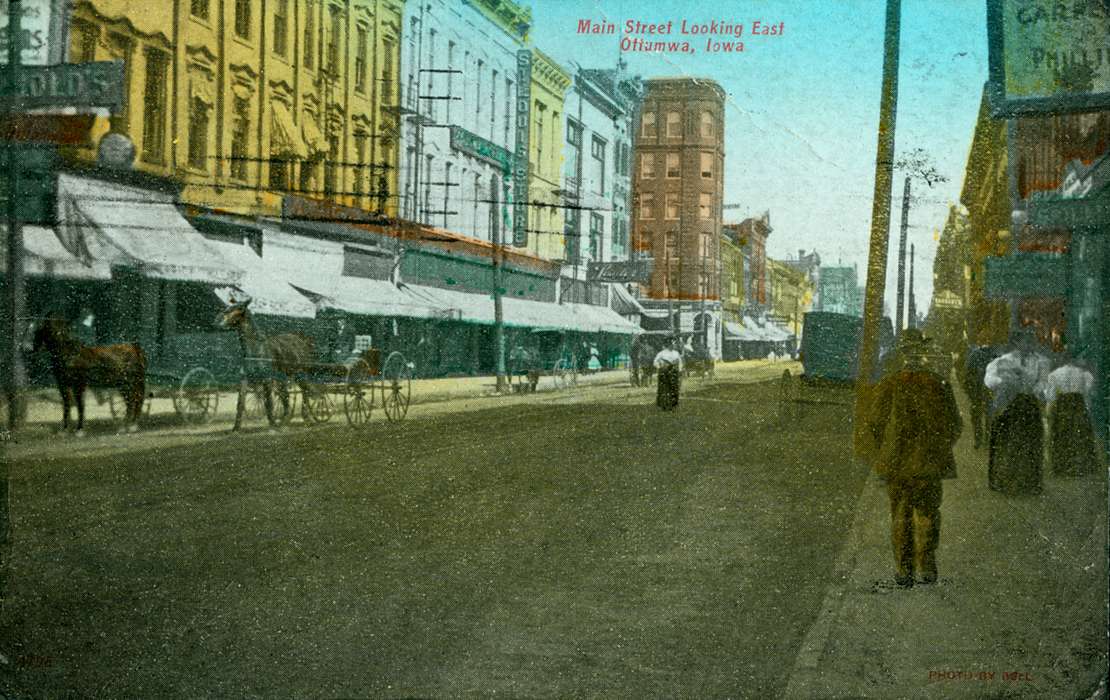 mainstreet, Main Streets & Town Squares, history of Iowa, Iowa History, Ottumwa, IA, Lemberger, LeAnn, storefront, veranda, Businesses and Factories, Animals, horse and buggy, Iowa, Cities and Towns