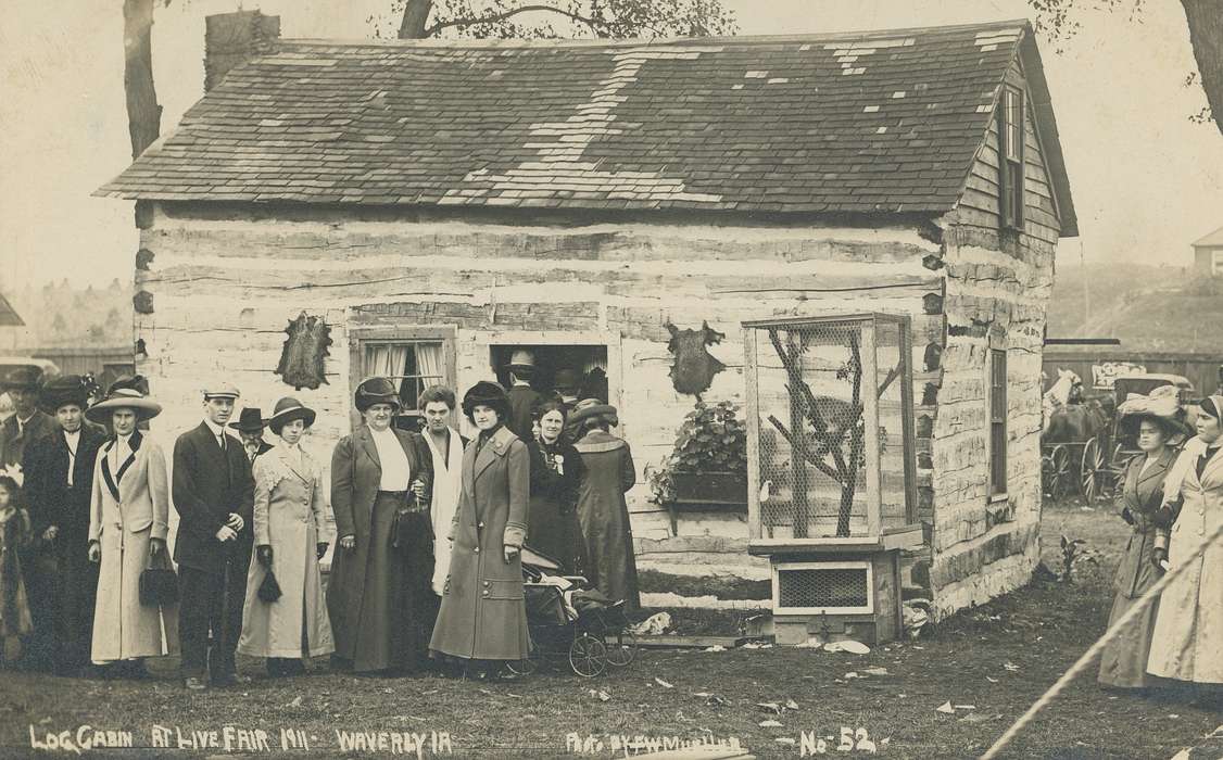 log cabin, men, Waverly Public Library, Iowa, Fairs and Festivals, history of Iowa, Iowa History, women