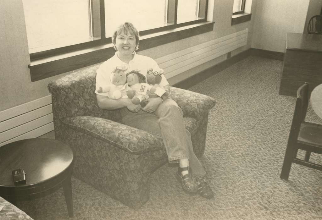 history of Iowa, furniture with cushions, Iowa History, stuffed animal, end table, librarian, library, chair, Iowa, Waverly Public Library, Labor and Occupations