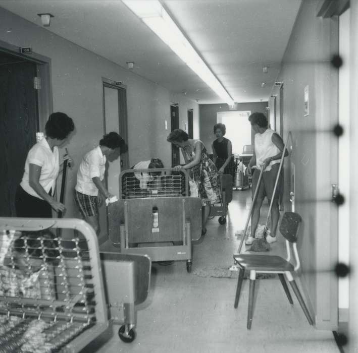 main street, Hospitals, hospital bed, Iowa History, Waverly Public Library, fluorescent light fixture, hallway, Iowa, history of Iowa, nurses, women at work, chair, women, Labor and Occupations, Main Streets & Town Squares