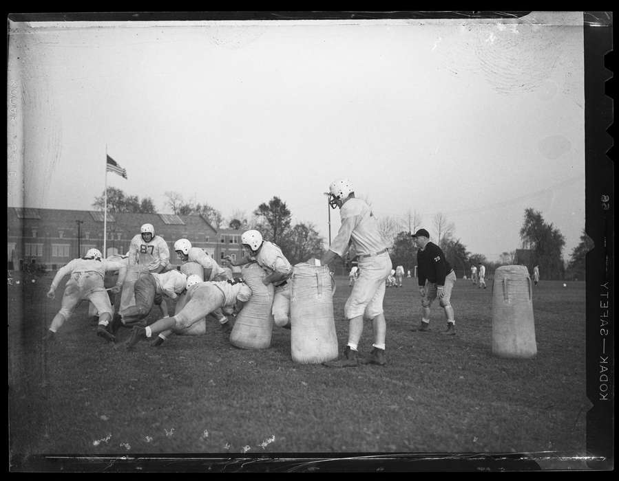 Iowa, Storrs, CT, history of Iowa, football, Archives & Special Collections, University of Connecticut Library, tackle, helmet, Iowa History