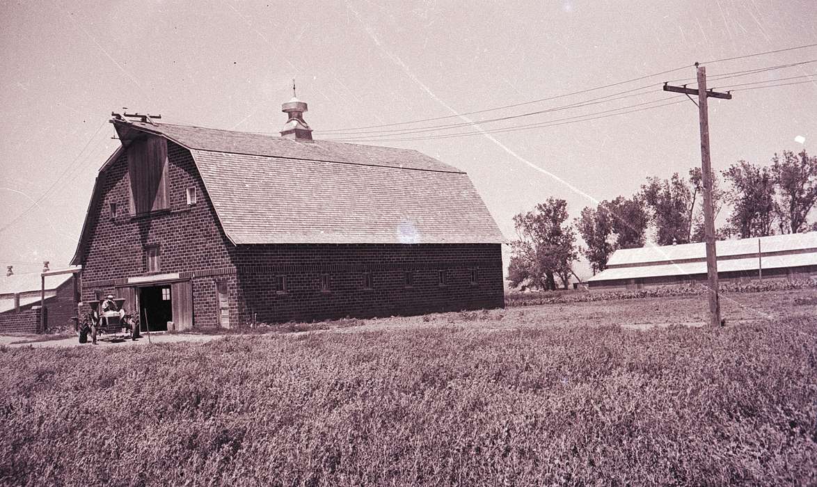 brick barn, Iowa, Orange City, IA, Barns, Lyon, Howard, power line, roof, tractor, Farms, history of Iowa, Motorized Vehicles, Iowa History