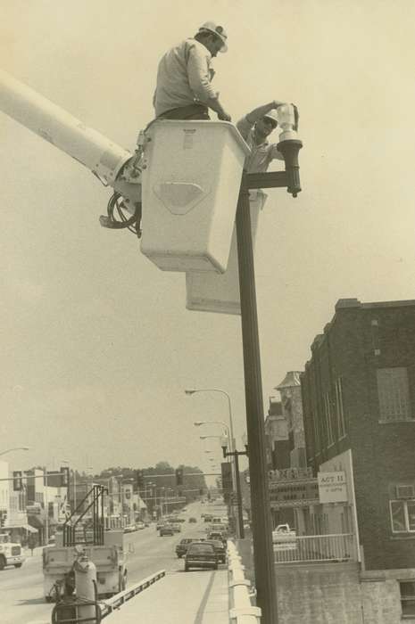 Labor and Occupations, Waverly Public Library, crane, Iowa History, Waverly, IA, street, bridge, Portraits - Group, Businesses and Factories, history of Iowa, brick building, lamppost, Iowa, hard hat, Main Streets & Town Squares, movie theater, Aerial Shots, store