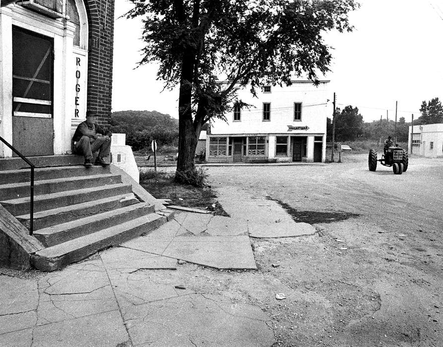 Main Streets & Town Squares, Farming Equipment, history of Iowa, Iowa History, Lemberger, LeAnn, storefront, Motorized Vehicles, Businesses and Factories, store, tractor, dirt road, Melrose, IA, Iowa, Cities and Towns, steps