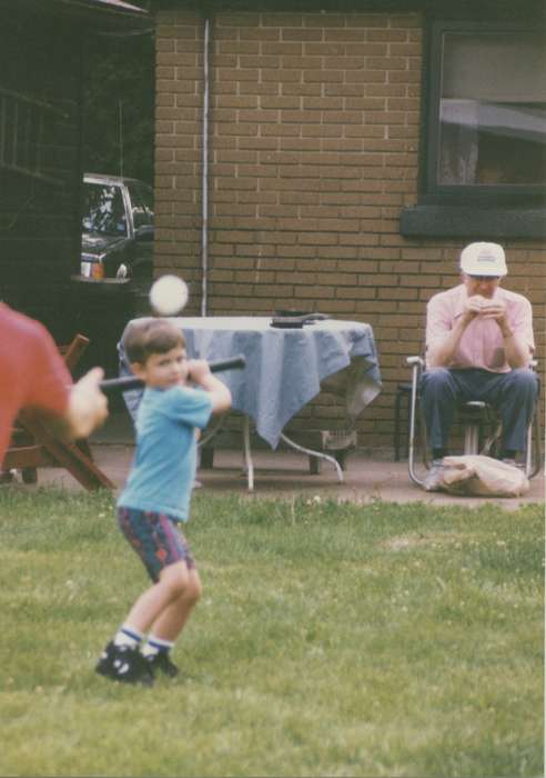 history of Iowa, swinging, pitching, young boy, Moline, IL, baseball, Iowa, batting, Iowa History, Children, Sports, lawn chair, Feeney, Mary, outdoors