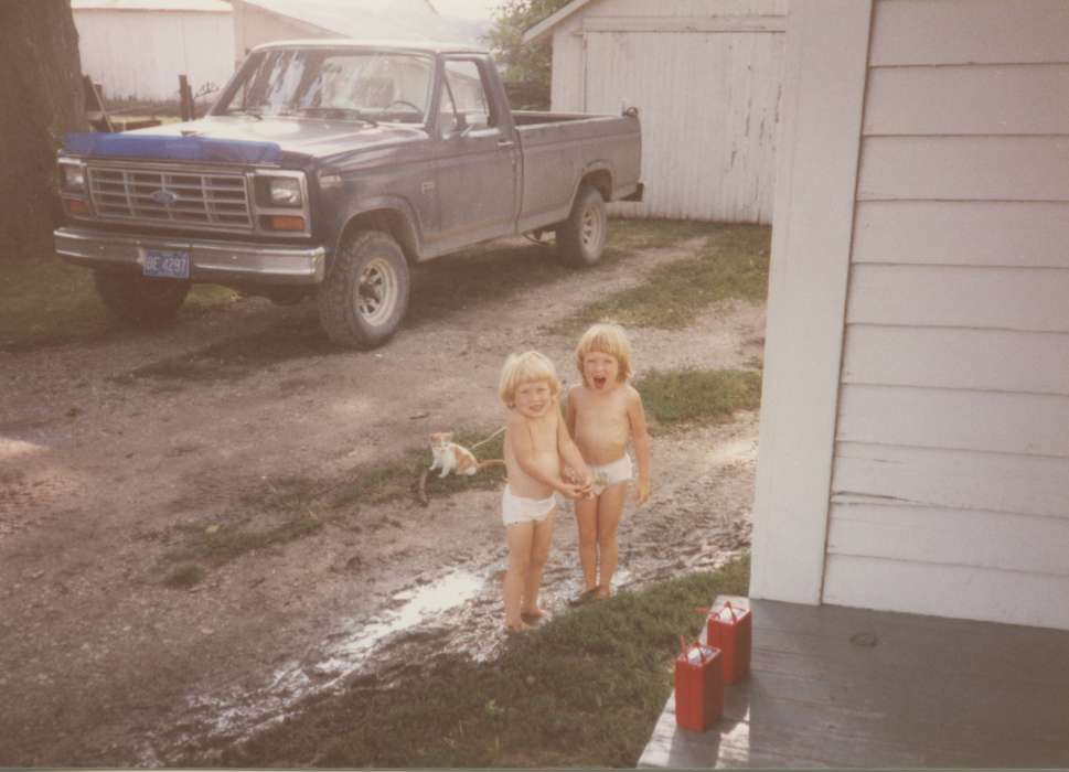 Portraits - Group, gasoline can, Boylan, Margie, mud, diaper, kitten, history of Iowa, Iowa History, truck, ford, Animals, Murray, IA, Iowa, Farms, Children, Leisure