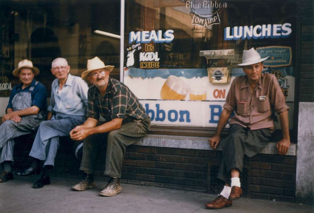 Portraits - Group, Businesses and Factories, shoes, Cities and Towns, restaurant, beer, hat, Waverly Public Library, Main Streets & Town Squares, history of Iowa, advertisement, Iowa History, storefront, boots, Waverly, IA, plaid, Iowa, sign, overalls, Leisure, bench