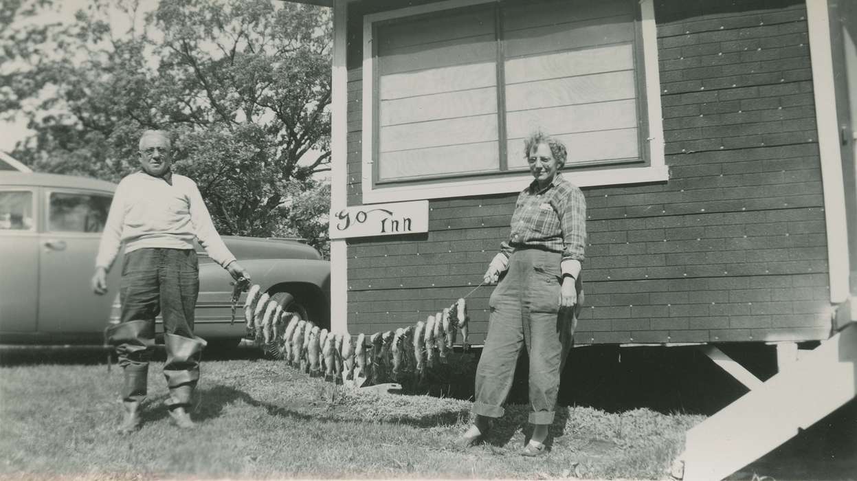 Elderkin, Don, Spring Lake, MN, fishing, fish, Motorized Vehicles, Iowa History, glasses, couple, Iowa, history of Iowa, Portraits - Group, Animals, Outdoor Recreation, window