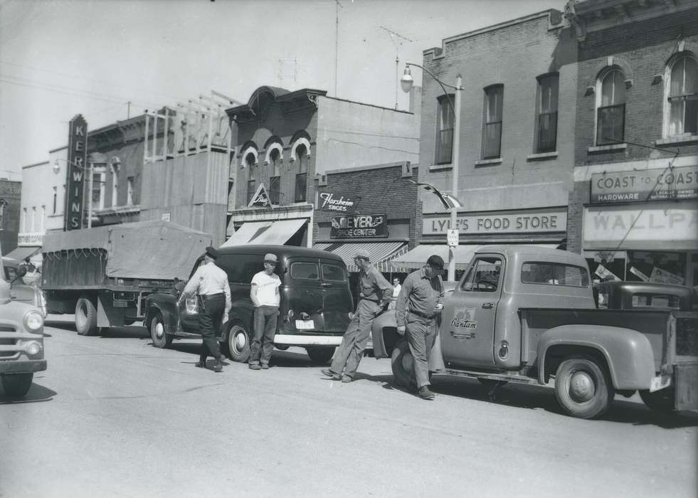 Main Streets & Town Squares, history of Iowa, cars, stores, trucks, IA, Iowa History, Motorized Vehicles, Businesses and Factories, buildings, town street, town, Iowa, Cities and Towns, Waverly Public Library