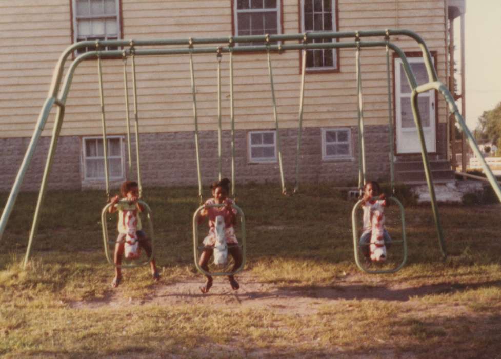Portraits - Group, african american, People of Color, history of Iowa, Iowa History, Henderson, Jesse, Iowa, Waterloo, IA, Children, swing set