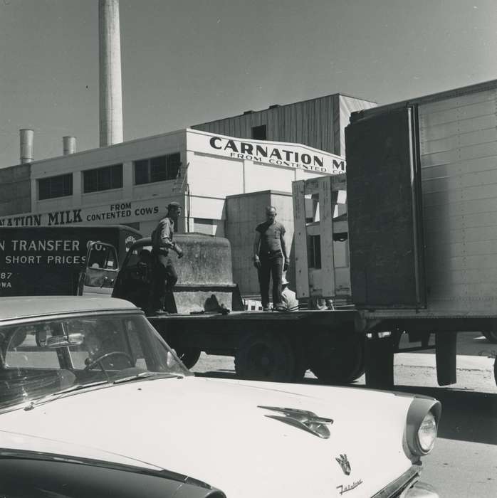 milk truck, factory, Iowa History, Waverly Public Library, workers, Iowa, history of Iowa, Businesses and Factories, carnation, car, factory work, IA, delivery truck, Labor and Occupations, working men