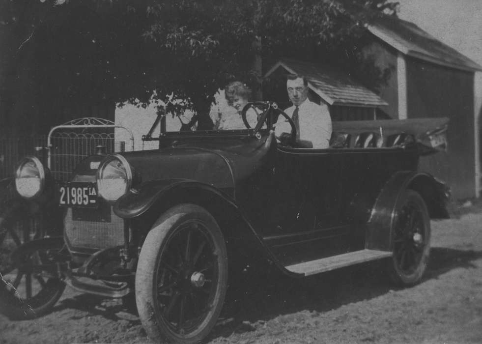 Portraits - Group, license plate, history of Iowa, Iowa History, IA, Feeney, Mary, Motorized Vehicles, couple, car, drive, Iowa, correct date needed