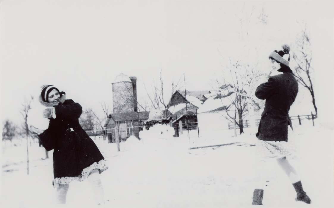 Outdoor Recreation, Keokuk County, IA, fun, silly, hat, Leisure, Children, sisters, snowball fight, Entertainment, family, history of Iowa, farm, snow, Iowa History, snowball, Iowa, Fisher, Jennifer, barn, Families, girls, dress, Winter, buildings