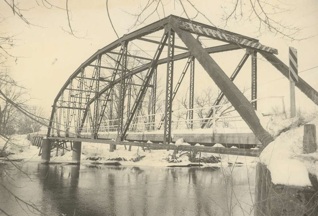 bridge, Iowa History, street sign, history of Iowa, tree, Winter, Lakes, Rivers, and Streams, water, river, Janesville, IA, Iowa, fence, snow, tree branches, Waverly Public Library