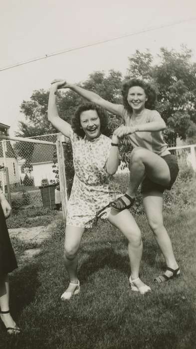 sandal, acrobatic, USA, Leisure, Iowa History, fence, Iowa, acrobats, history of Iowa, backyard, Portraits - Group, Homes, curly hair, jumpsuits, Wilson, Dorothy