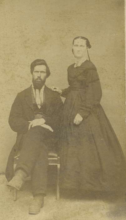 woman, frock coat, hoop skirt, beard, man, brooch, history of Iowa, ribbon, Iowa History, Portraits - Group, carte de visite, Iowa, vest, couple, bishop sleeves, Olsson, Ann and Jons, lace collar, mustache, dropped shoulder seams, Elkader, IA