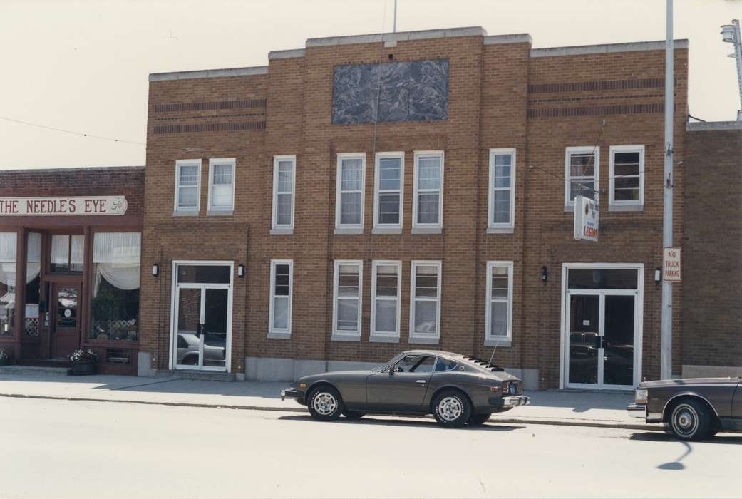 sign, history of Iowa, doorway, window, Businesses and Factories, tires, Waverly Public Library, Main Streets & Town Squares, storefront, car, Motorized Vehicles, Iowa, Iowa History, Cities and Towns