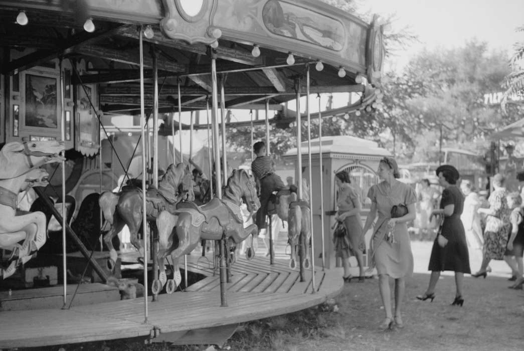 Library of Congress, Children, history of Iowa, carnival, Entertainment, fairground, Main Streets & Town Squares, Iowa, Leisure, Families, Outdoor Recreation, Iowa History, merry-go-round, carousel, Fairs and Festivals