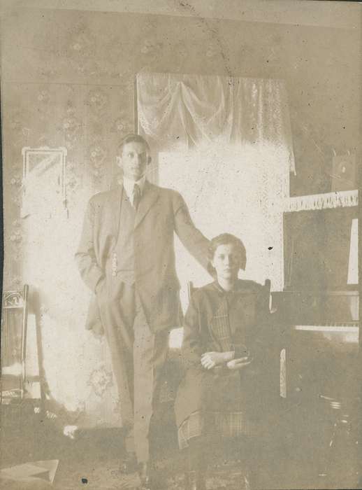 Neessen, Ben, wallpaper, Iowa History, couple, piano, mirror, Iowa, history of Iowa, Portraits - Group, Homes, lace curtains, IA