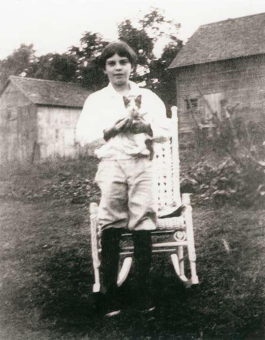 cat, history of Iowa, Iowa History, kitten, barn, buildings, trees, boots, rocking chair, Fisher, Jennifer, Sigourney, IA, Iowa, boy, Children, Portraits - Individual