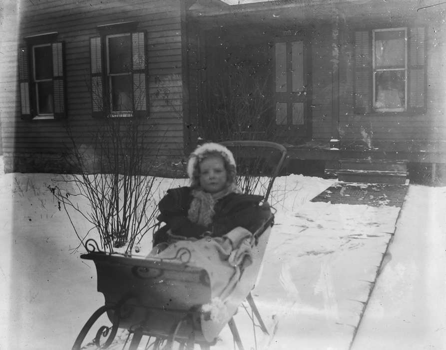 IA, Iowa, Children, winter, Portraits - Individual, Anamosa Library & Learning Center, history of Iowa, snow, Iowa History, sled