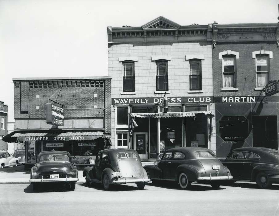 Waverly, IA, license plate, window display, history of Iowa, Motorized Vehicles, brick building, Main Streets & Town Squares, Iowa, Cities and Towns, car, sign, Waverly Public Library, Businesses and Factories, building, Iowa History