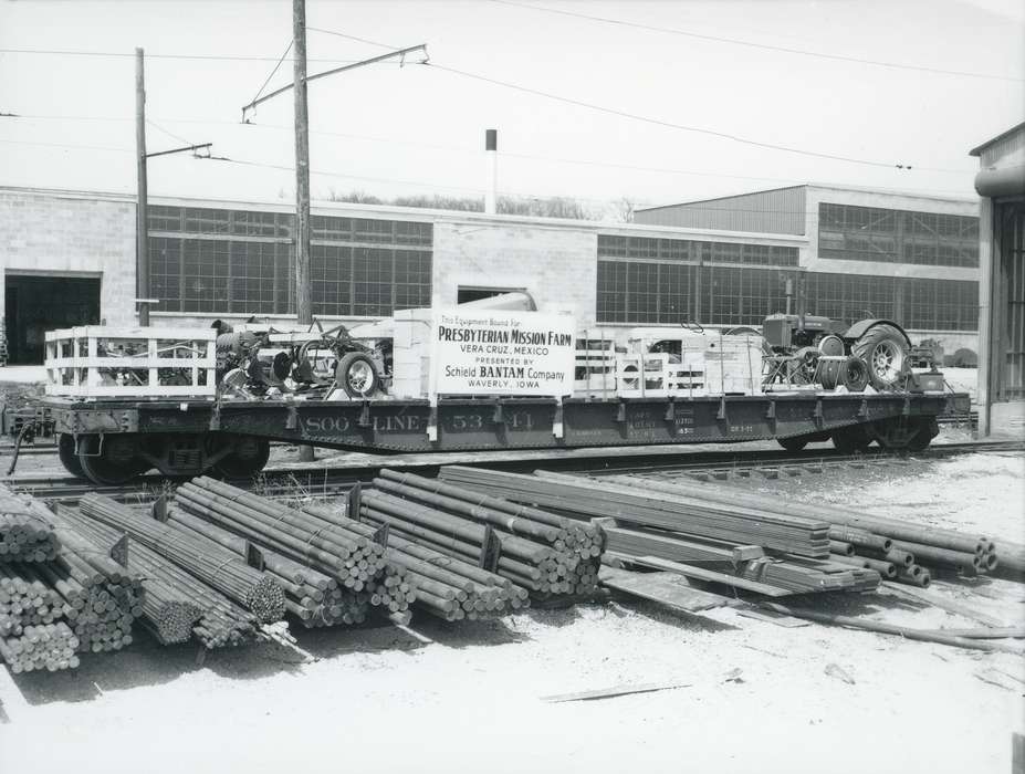 history of Iowa, lumber, Waverly Public Library, tractor, railroad track, Iowa, Motorized Vehicles, wood pile, Farming Equipment, Train Stations, Iowa History, IA