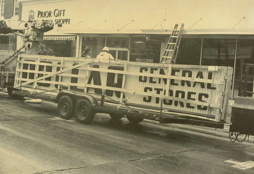 history of Iowa, Iowa History, general store, storefront, Businesses and Factories, Waverly, IA, trailer, Iowa, sign, ladder, Waverly Public Library, Labor and Occupations